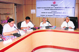 HBSE Chairman KC Bhardwaj (extreme right) addresses a seminar in Bhiwani.