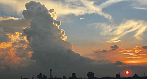 A view of a sunset on a cloudy evening in Karnal.