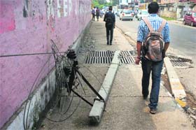 Dangerous: A broken electricity pole near Jammu University. Recent heavy rain has caused substantial damage to power infrastructure