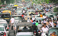 Vehicles line up outside St Josephs School, Jalandhar Cantonment, after members of the School Auto Rickshaw Tempo Travel Mini Van Union kept their vehicles off road against the district administrations polices in Jalandhar on Monday