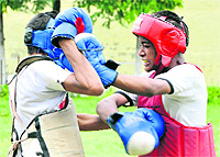 A boxing match in progress during the district-level school sports tournament on Tuesday