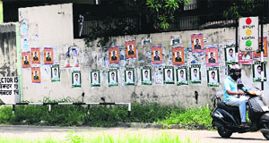 Posters of student leaders pasted on a wall at Sector 16 in Chandigarh.