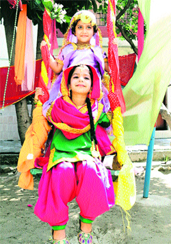 Teej being celebrated by tiny tots at a school in Jalandhar on Tuesday.