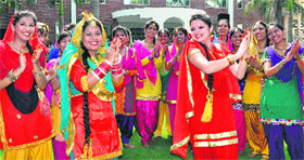 Students performing giddha during Teej celebrations at Lyallpur Khalsa College in Jalandhar on Tuesday.