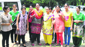 Students of the Inter National Institute of Fashion Design at the Mataur police station, Phase VII, Mohali, on Wednesday.