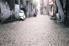 A waterlogged street after a heavy downpour in Dehradun on Wednesday.