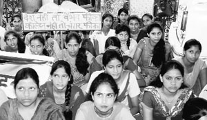 Students, staff and villagers hold a rally in Dharamsala on Wednesday. 