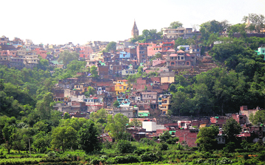 A view of houses on a hill in the old Jammu city area.