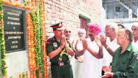 Lt Gen Sandeep Singh lays the foundation stone of a marriage-cum-community hall at Burail village in Chandigarh. 