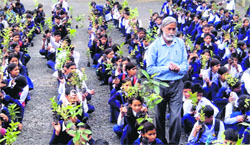Students of Government Inter-College in Kempty village pledge to grow more trees on Thursday.