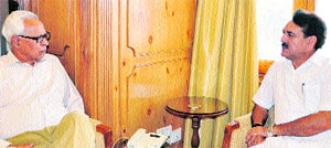 Governor NN Vohra with Jugal Kishore Sharma at Raj Bhawan in Srinagar on Thursday. 