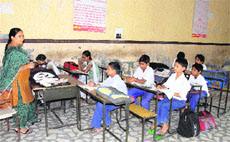 A class running in a government school without computers in Jalandhar.