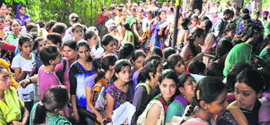 Students line up to submit examination forms at the Jammu University on Thursday. Tribune photo: Inderjeet Singh