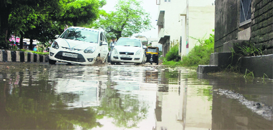 Rains have exposed the claims of the authorities as roads in the Jammu city are waterlogged. Tribune photo: Anand Sharma