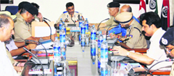 Rajesh Kumar , IGP Jammu, reviews security arrangements in the run up to Independence Day in Police Control Room, Jammu, on Thursday. A Tribune Photograph