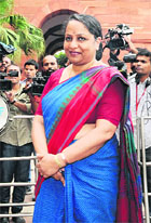Sujatha Singh arrives at the External Affairs Ministry in New Delhi on Thursday.