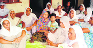 The drivers relatives at his house in Vaan Tara Singh village, Tarn Taran. 