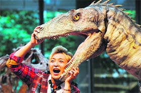 Dino-show: Japanese actor Takeshi Tsuruno at the opening of a dinosaur exhibition in Tokyo on Thursday