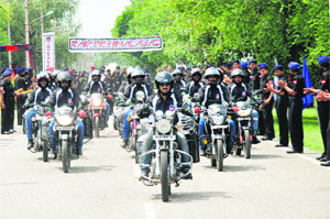 Members of an Army motorcycle expedition, the Raid-De-Himalaya, leave Bathinda on Friday. Lieutenant General PR Kumar, VSM, General Officer Commanding, 1Corps, flagged off the expedition.