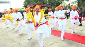 Artistes perform a folk dance during the flagging off cermony of the Sarva Shreshtha Raid-De-Himalaya Motorcycle Expedition in Bathinda on Friday. 