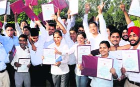 Students of Indo-Swiss Training Centre in a jubilant mood after receiving their degrees in Chandigarh on Friday