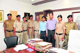 Rewarded police personnel with UT IGP RP Upadhyaya (third from right) in Chandigarh