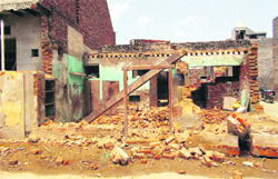 A demolished structure at Bhainswal Kalan village in Sonepat district on Friday. Photo: BS Malik