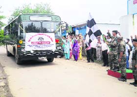 Army officers flag off an education-cum-motivational tour of 22 girl students from Nowshera on Thursday