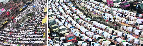 People offer prayers outside the Grand Mosque on the occasion of Jumat-ul-Vida, the last Friday of the holy Islamic month of Ramadan in Srinagar