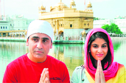 Actress Anisha Pooja and Sarabjeet Cheema pay obeisance at the Golden Temple in Amritsar on Saturday. Photo: Sameer Sehgal