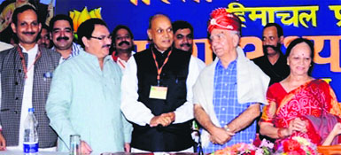 Former CM PK Dhumal with Rajya Sabha member Shanta Kumar and other leaders at Palampur on Saturday. 