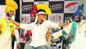 Bollywood megastar Shahrukh Khan performs bhangra to promote his upcoming movie "Chennai Express"  in Jalandhar on Saturday