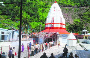 Devotees throng the Buddha Amarnath shrine at Rajpura Mandi in Poonch district on Saturday.