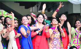 Girls revel during Teej celebrations at Green Land Senior Secondary School in Ludhiana.