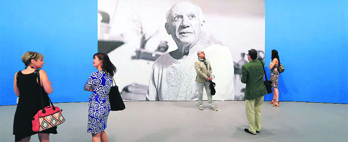 Visitors at an exhibition dedicated to Spanish painter Pablo Picasso at the Grimaldi Forum in Monaco. The exhibition will run till September 15.