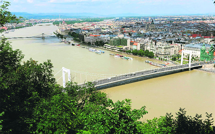 River Danube in spate below the Elisabeth Bridge (R) and the Chain Bridge (L) in Budapest. The Hungarian capital last month averted the worst of the floods that caused devastation elsewhere in central Europe, as flood defences held firm, with the Danube starting to recede after reaching a historic high.