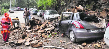 A car buried in a heavy landslide in Shimla