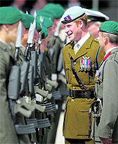 Britains Prince Harry meets servicemen during a visit to the Royal Marines Tamar centre at the HM Naval Base, Plymouth, on Friday