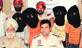 GRP officials with the accused in Amritsar on Sunday.