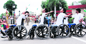 Children from Ability Unlimited Foundation perform during the retreat ceremony at Wagah border near Amritsar.