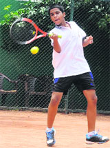 A player in action during a tennis match at The British School, Sector 70, in Mohali on Sunday.