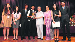 RK Saboo, chairman of Bharatiya Vidya Bhavan, felicitates winners on the concluding day of the Model United Nations conference in Chandigarh on Sunday. 