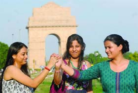 BEST BUDDIES: Girls celebrate Friendship Day at India Gate in New Delhi on Sunday