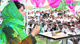 PDP president Mehbooba Mufti addressing party workers at Shopian in south Kashmir on Sunday. 