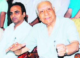 Balramji Das Tandon, state BJP poll panel chief, addresses mediapersons in Amritsar on Sunday.