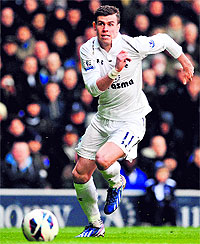 Real Madrid are in talks to try to sign Gareth Bale, coach Carlo Ancelotti has revealed of highly rated winger