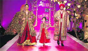 Models showcase Ritu Beris collection at the Delhi Couture Week.