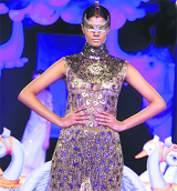 A model displays a creation by designer Manish Arora at the Delhi Couture Week.