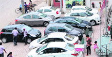 Vehicles parked in front of a mall in Amritsar. 