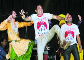 Shaking a leg: Punjabi singer Sarabjit Cheema performs during the promotion of his film Punjab Bolda in Bathinda on Sunday night